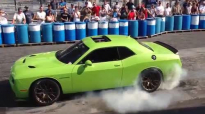 Ralph Gilles burnout with the 707hp Dodge Challenger SRT Hellcat at the Carlisle Chrysler Nationals!.mp4