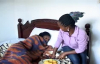 Kansiime Anne attending to a patient.mp4