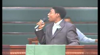 Minister Reginald Sharpe Jr. Singing(www.realsharpejr.com).flv