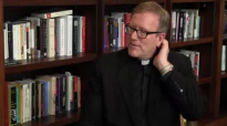 Why pray to the saints (#AskFrBarron).flv