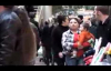 People singing Christmas songs at the mall and everybody sings along wonderful and touching.flv